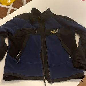 Blue and Black Gore Windstopper Fleece with four pockets and pit zips.